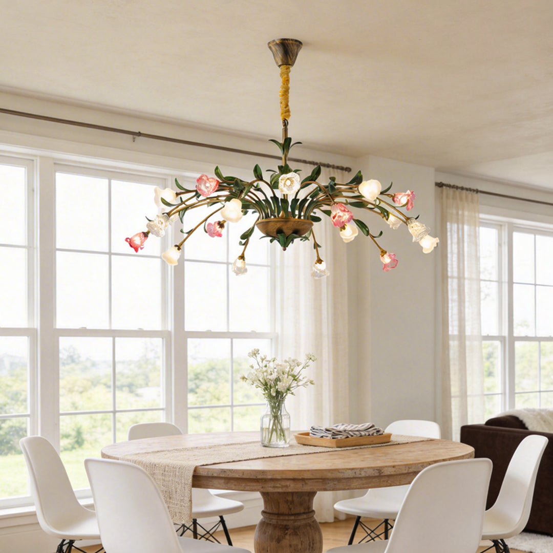 Floral chandelier with pink and white blooms in a classic dining room