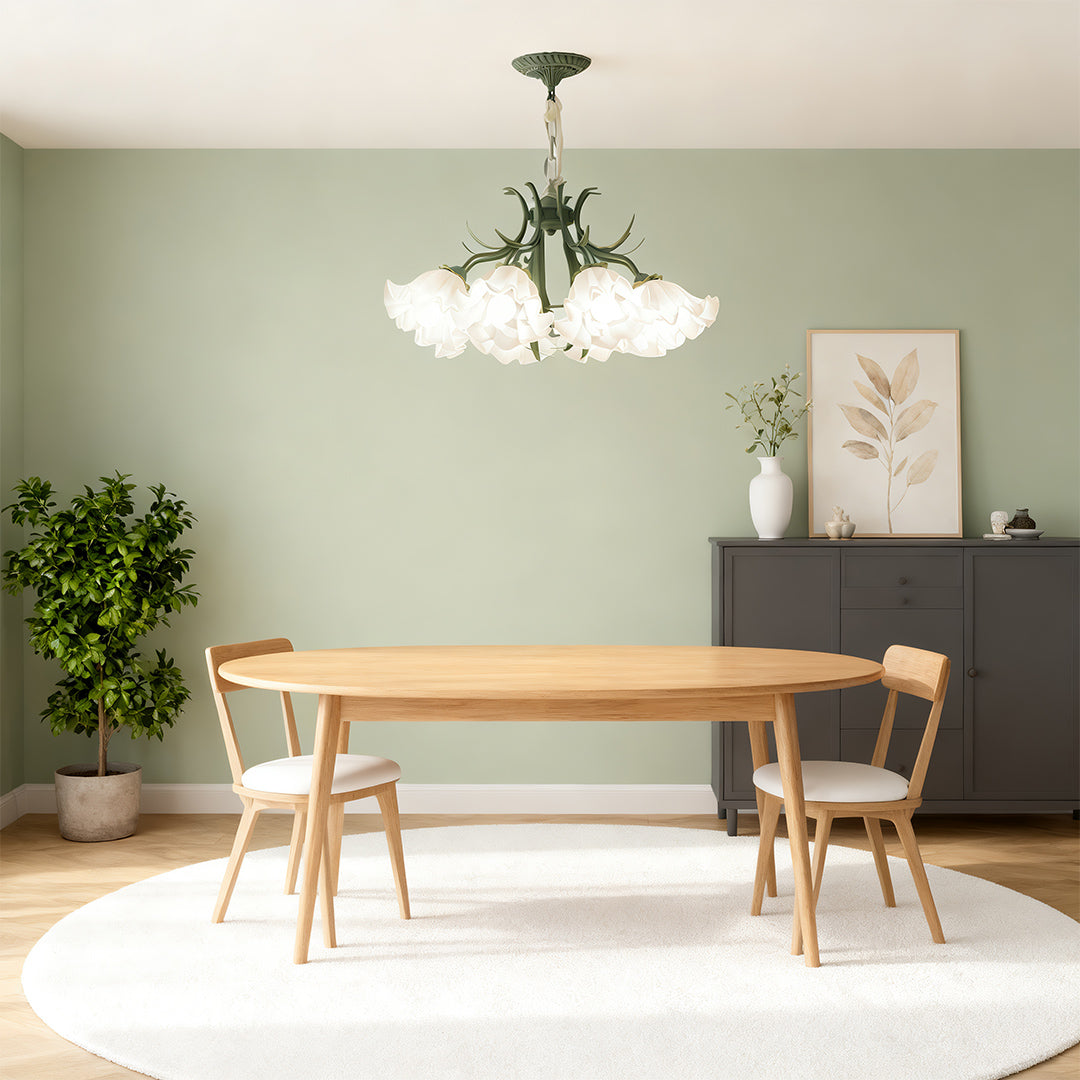 Flower chandelier giving warm light in a modern dining room
