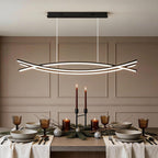 Wave pendant light over an elegant dining setting