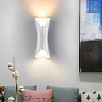White up down wall light mounted on an indoor wall