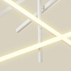 White iron chandelier with crossed arms giving ambient light