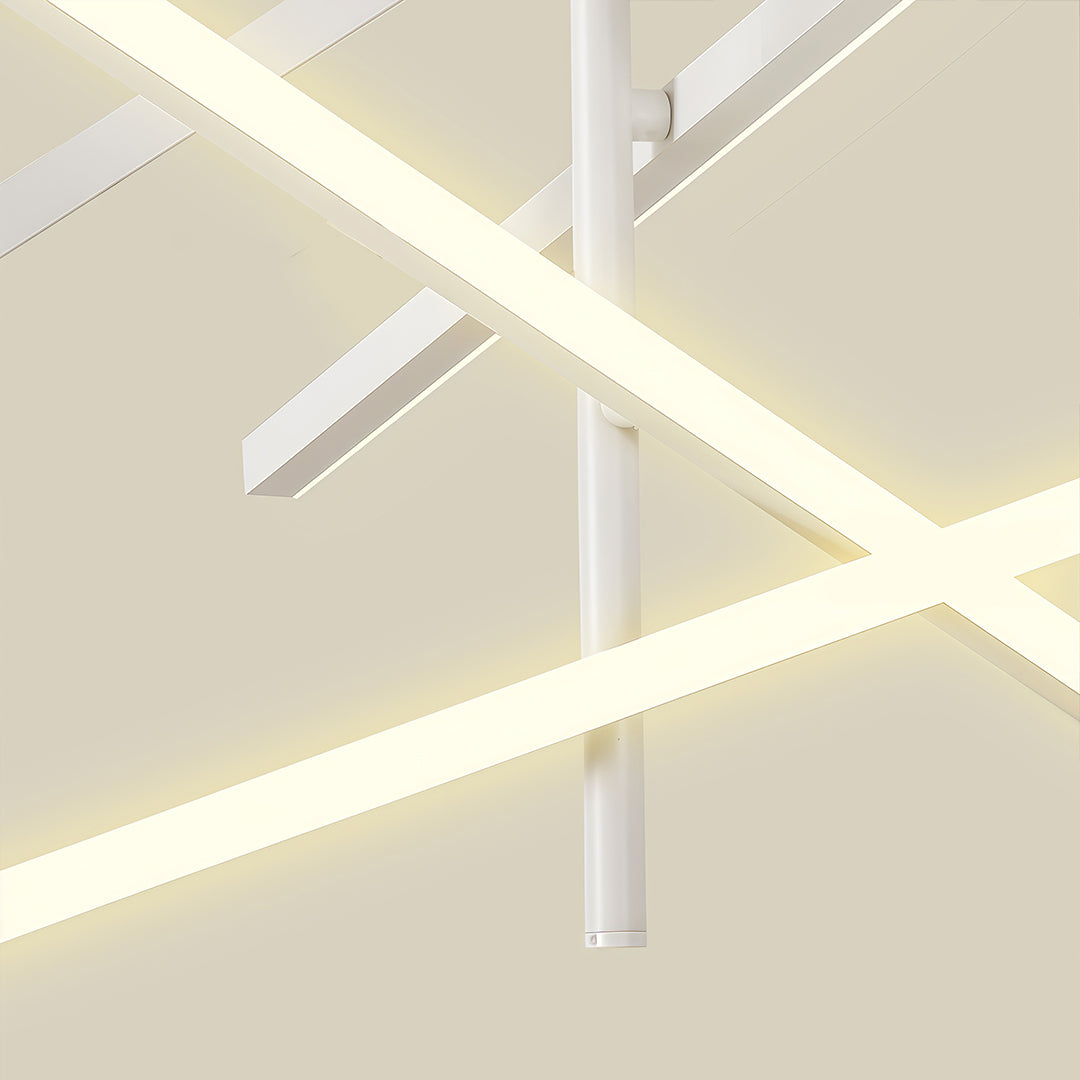 White iron chandelier with crossed arms giving ambient light