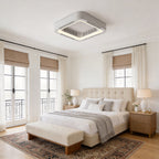 White bladeless ceiling fan light in a classic beige bedroom