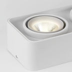 White grid spotlight showing its adjustable rotating head