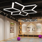 Y-shaped linear lights on a creative commercial ceiling