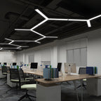 Y-shaped linear light fitted to a modern office ceiling